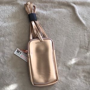 Rose gold phone purse. Brand My Tagalong.